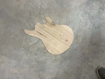 guitarshapeonfloor.jpg.webp